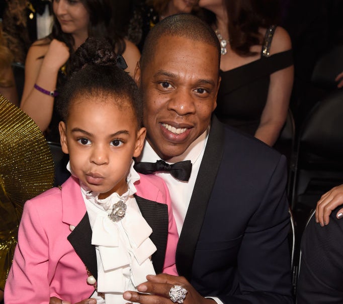 jay z and a younger blue at an event