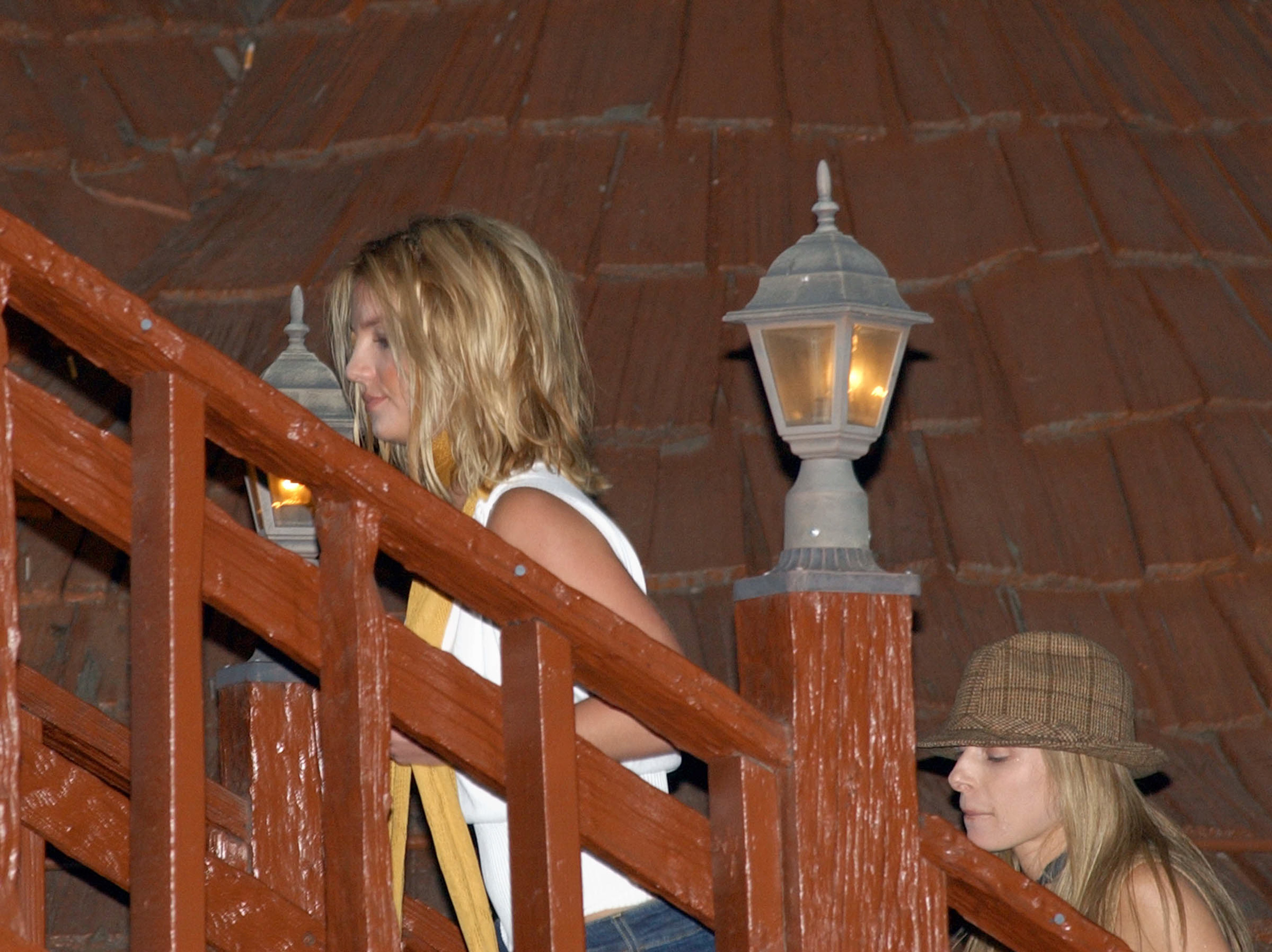 closeup of britney walking up stairs