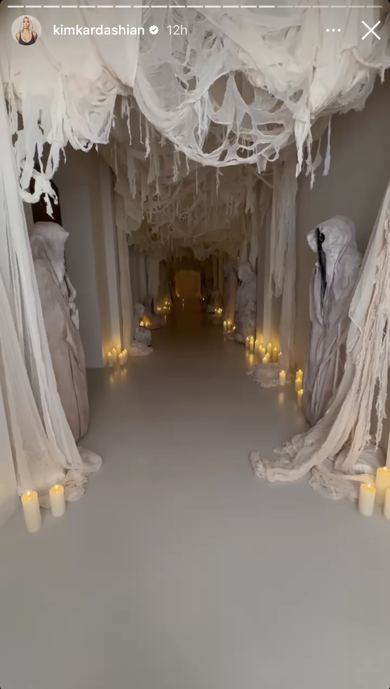 life-sized ghouls standing throughout the hallway
