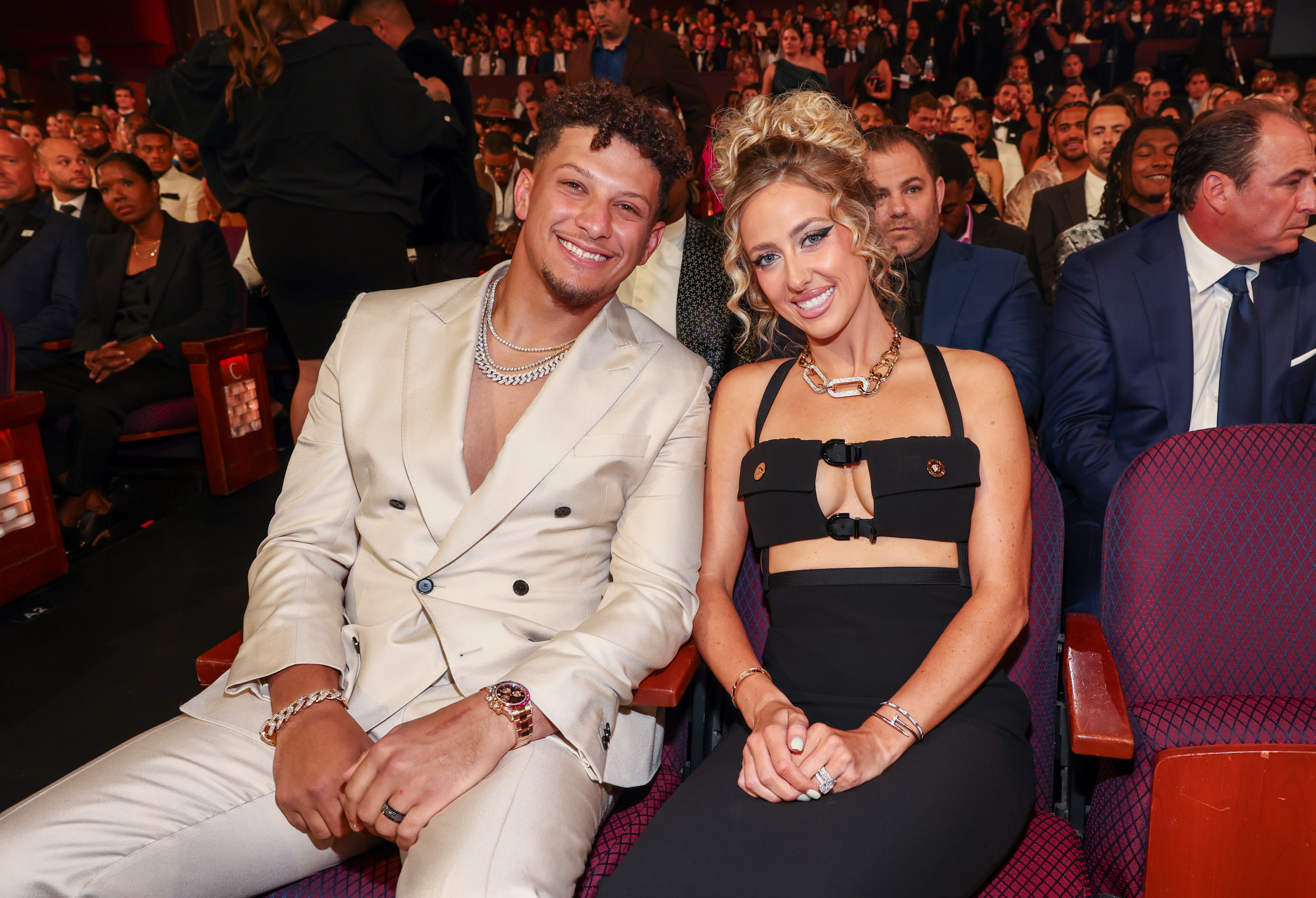 patrick and brittany sitting at an event