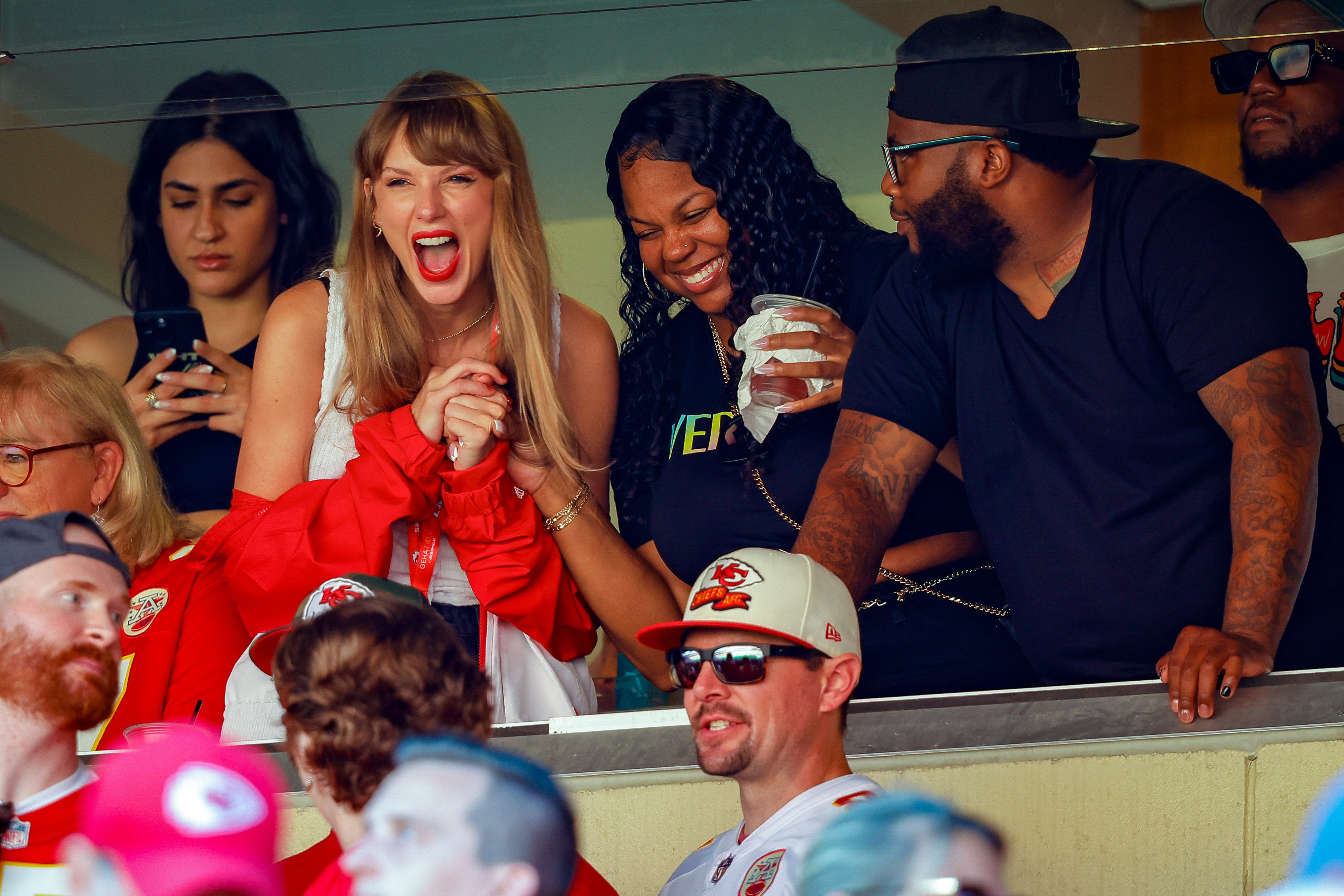 taylor cheering at the game