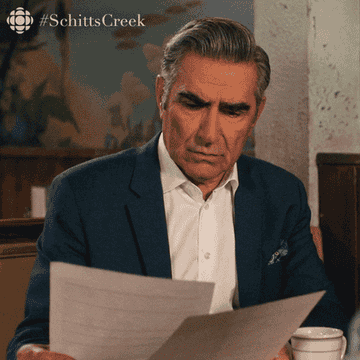 Eugene Levy in Schitt's Creek reads "What am I looking at?" in confusion.