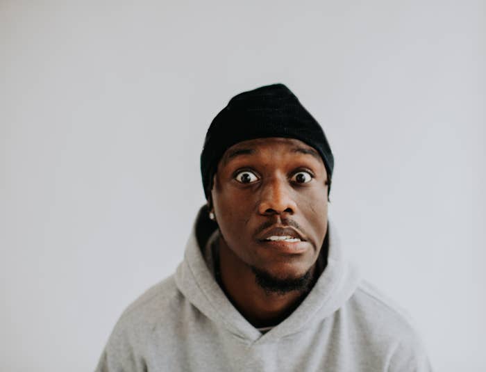 A man making a cringy face