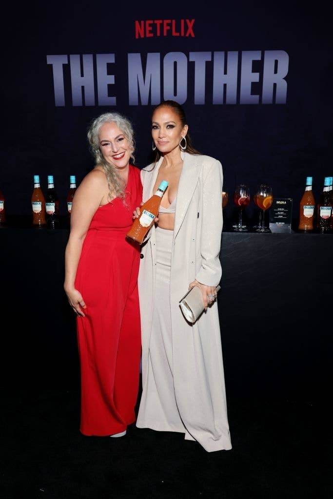 the two with their  cocktails at a netflix event
