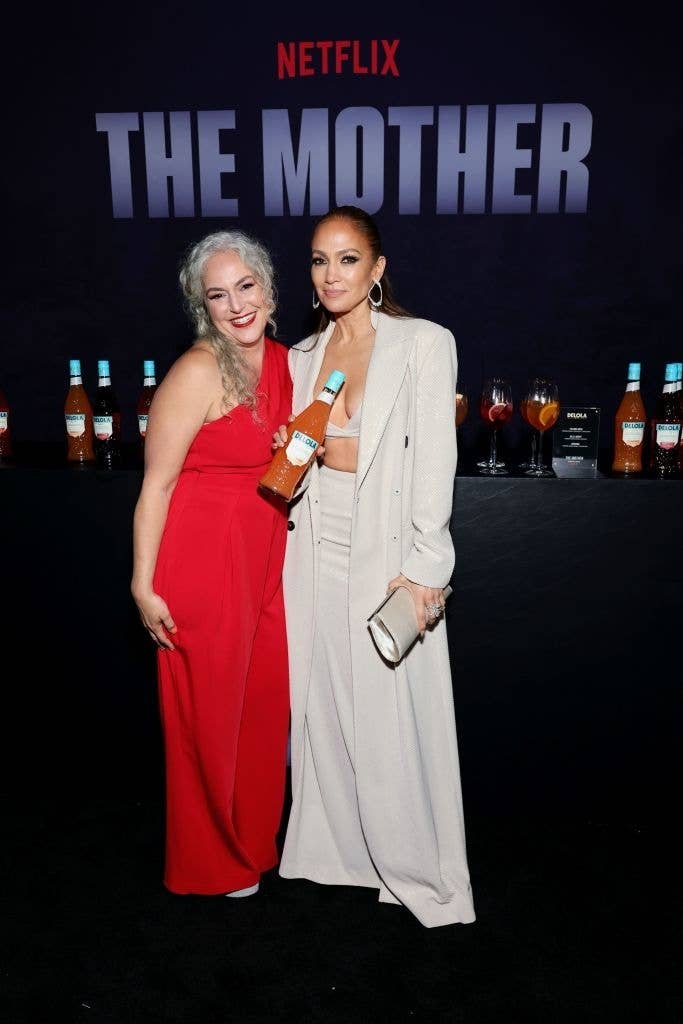 the two with their cocktails at a netflix event