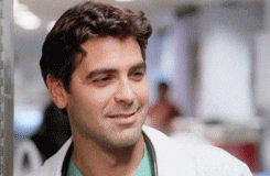 George Clooney in ER nods and smiles.