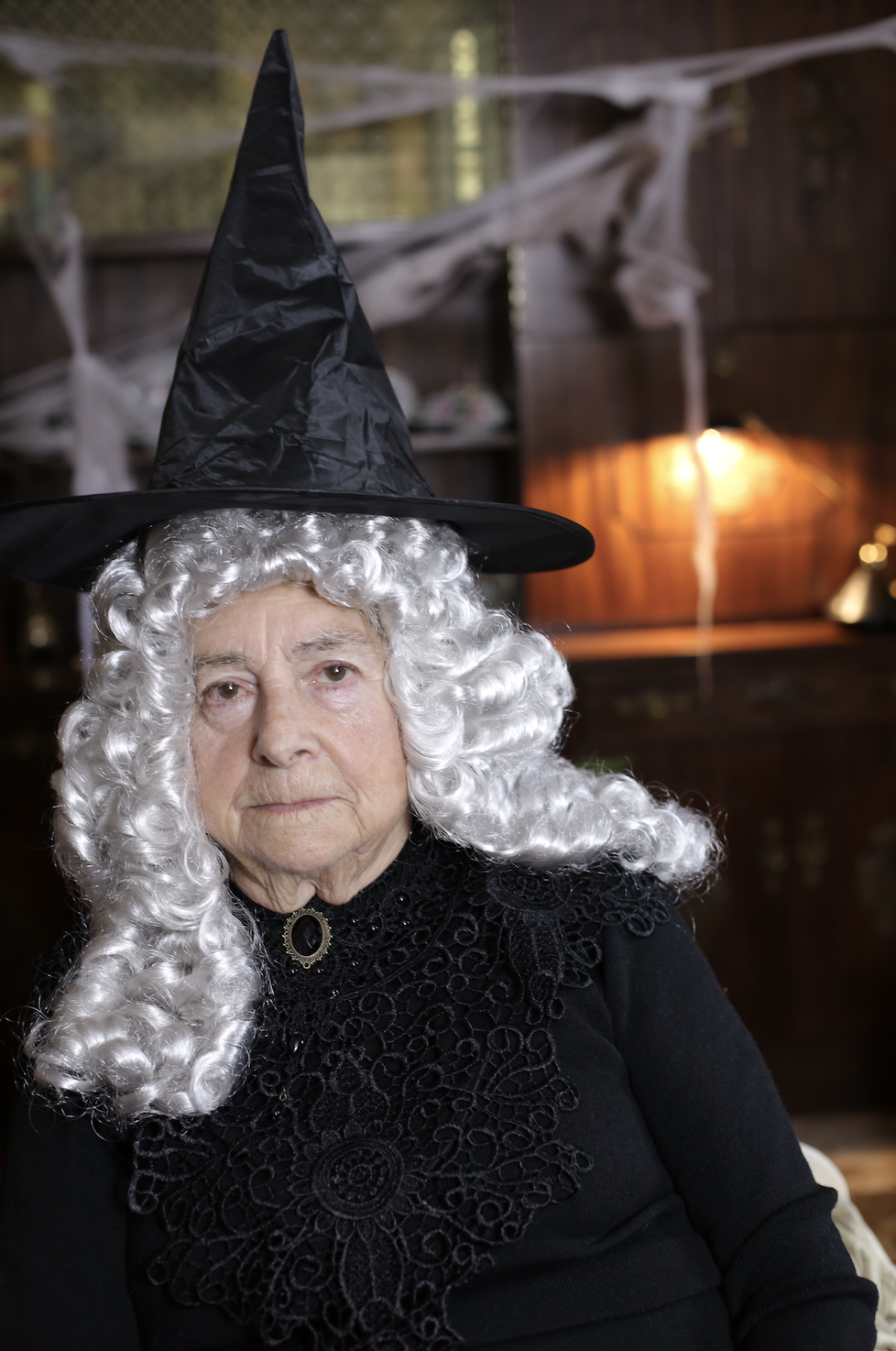 A woman dressed like a witch