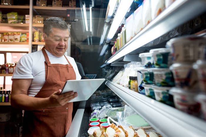 A man working in a grocery store