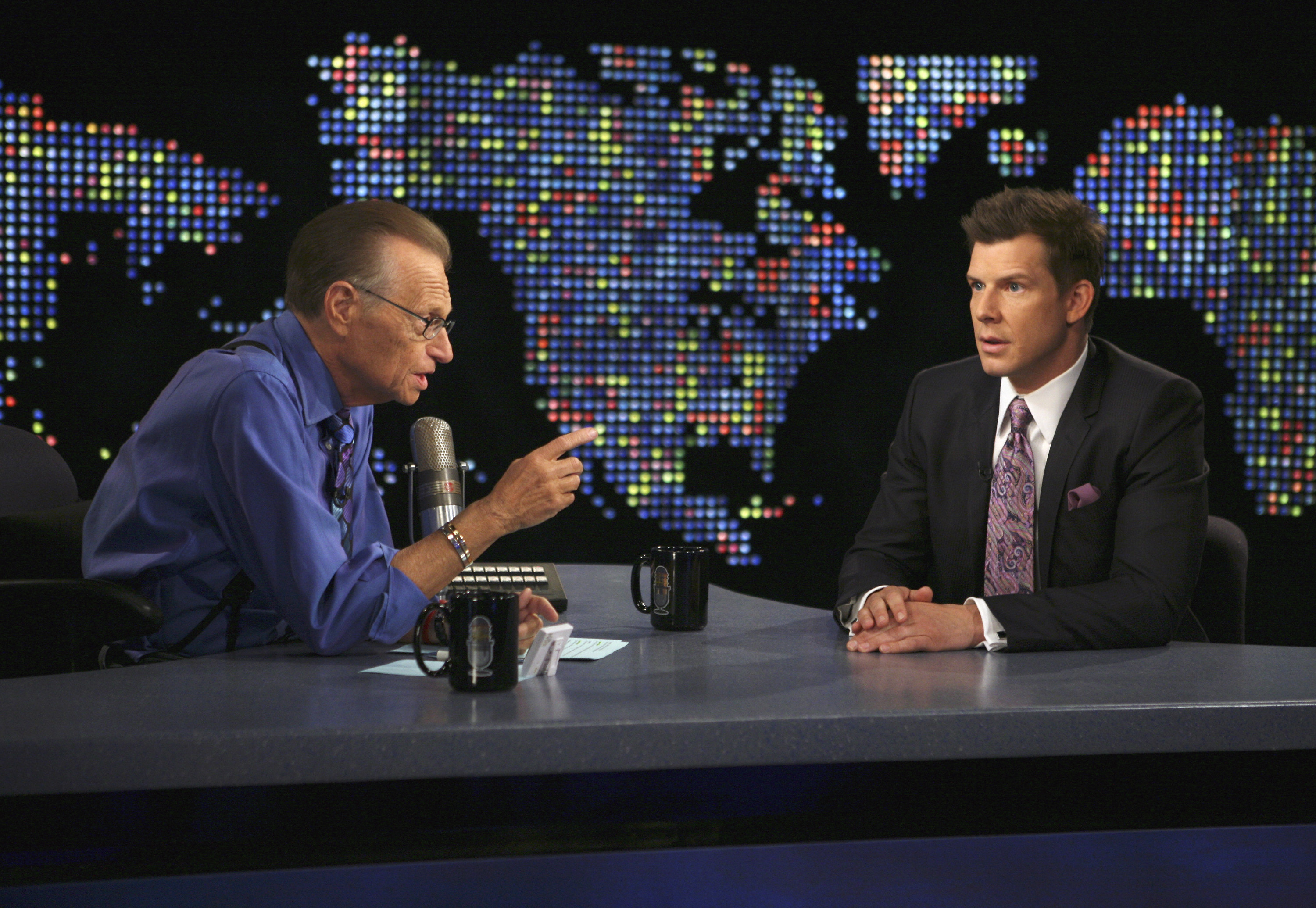 Daniel being interviewed by larry king