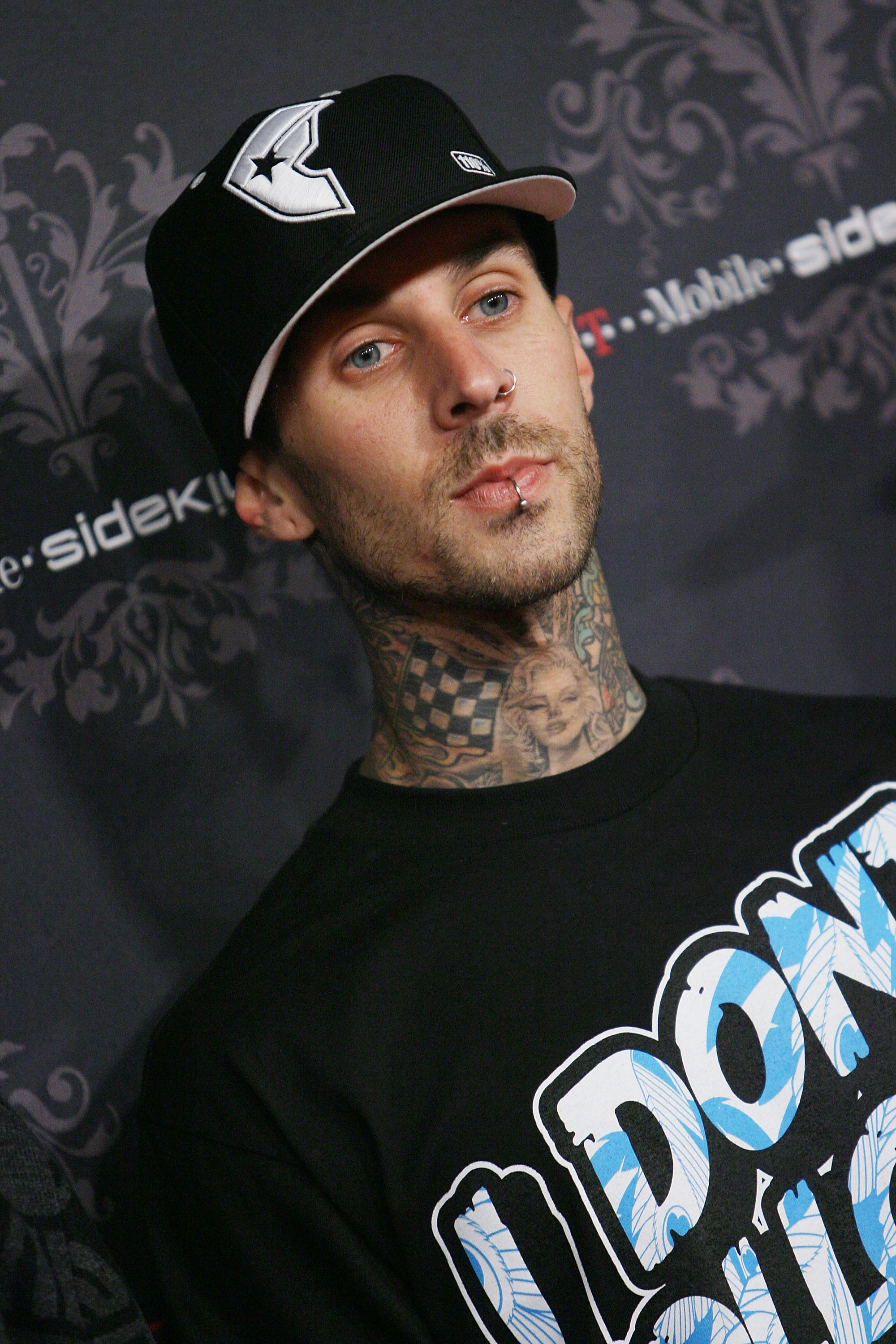 Close-up of Travis wearing a cap and T-shirt