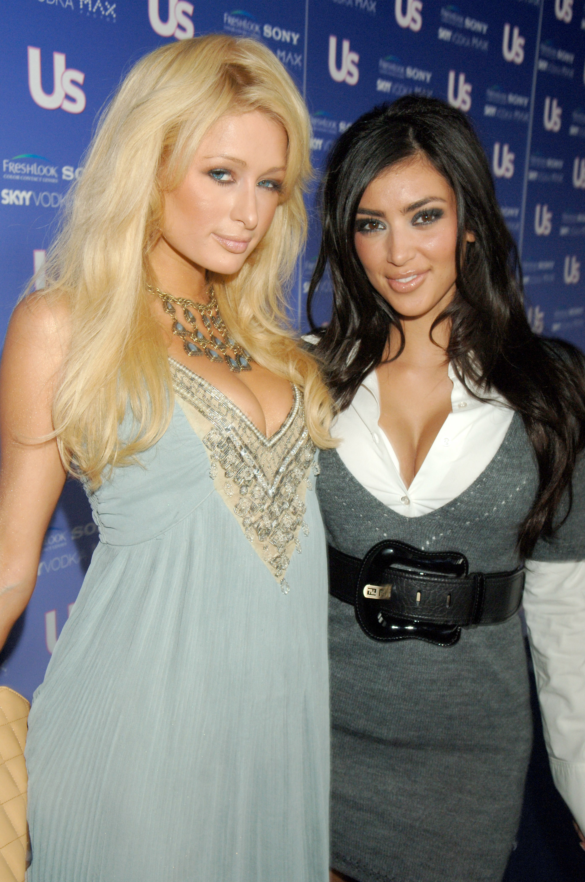 Close-up of Kim and Paris smiling and standing together at a media event