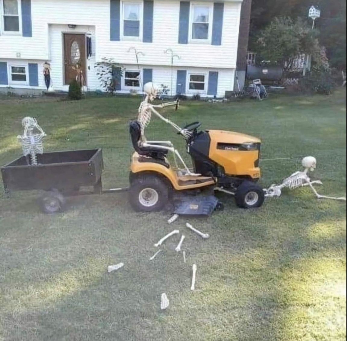 skeletons mowing the lawn