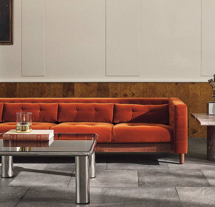 an orange velvet sofa