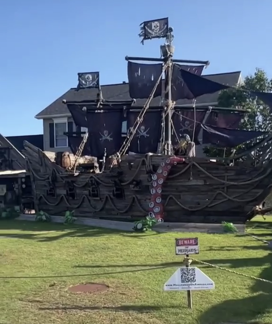 a huge pirate ship in someone's lawn