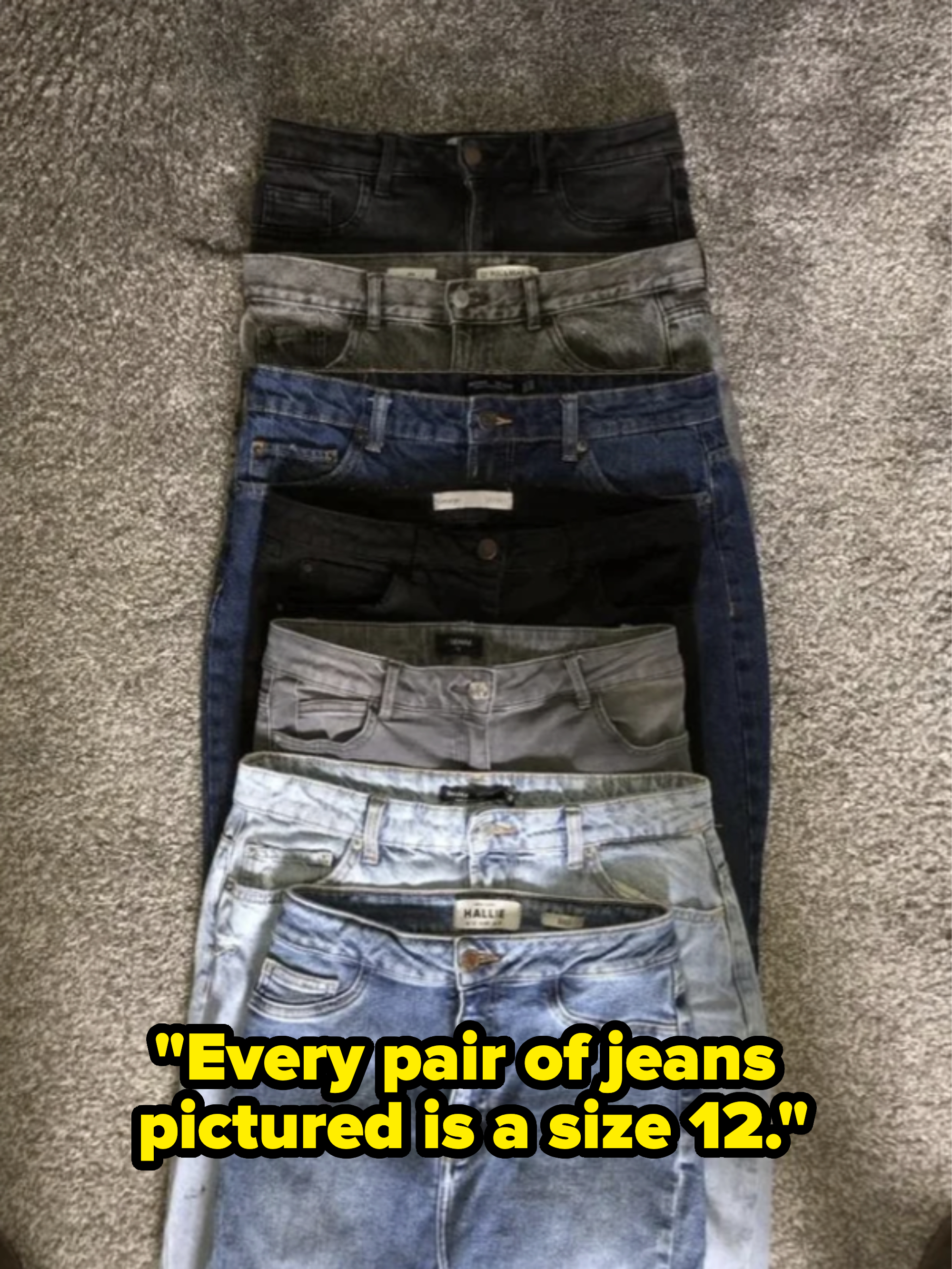 seven pairs of jeans all labeled as size 12 that vary greatly in actual size
