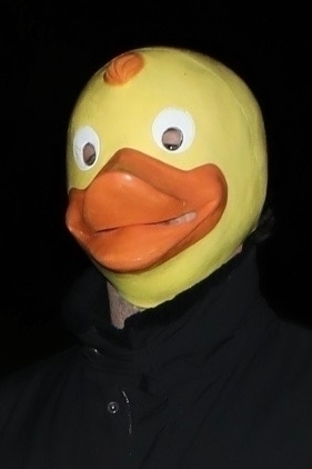 Closeup of Leonardo DiCaprio wearing a duck mask