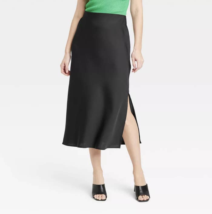A black midi slip skirt