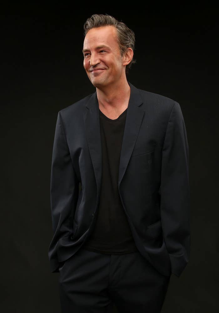 A portrait shot of Matthew Perry smiling