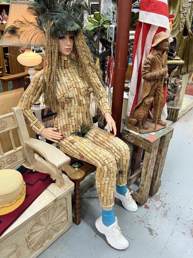 a mannequin made of corks