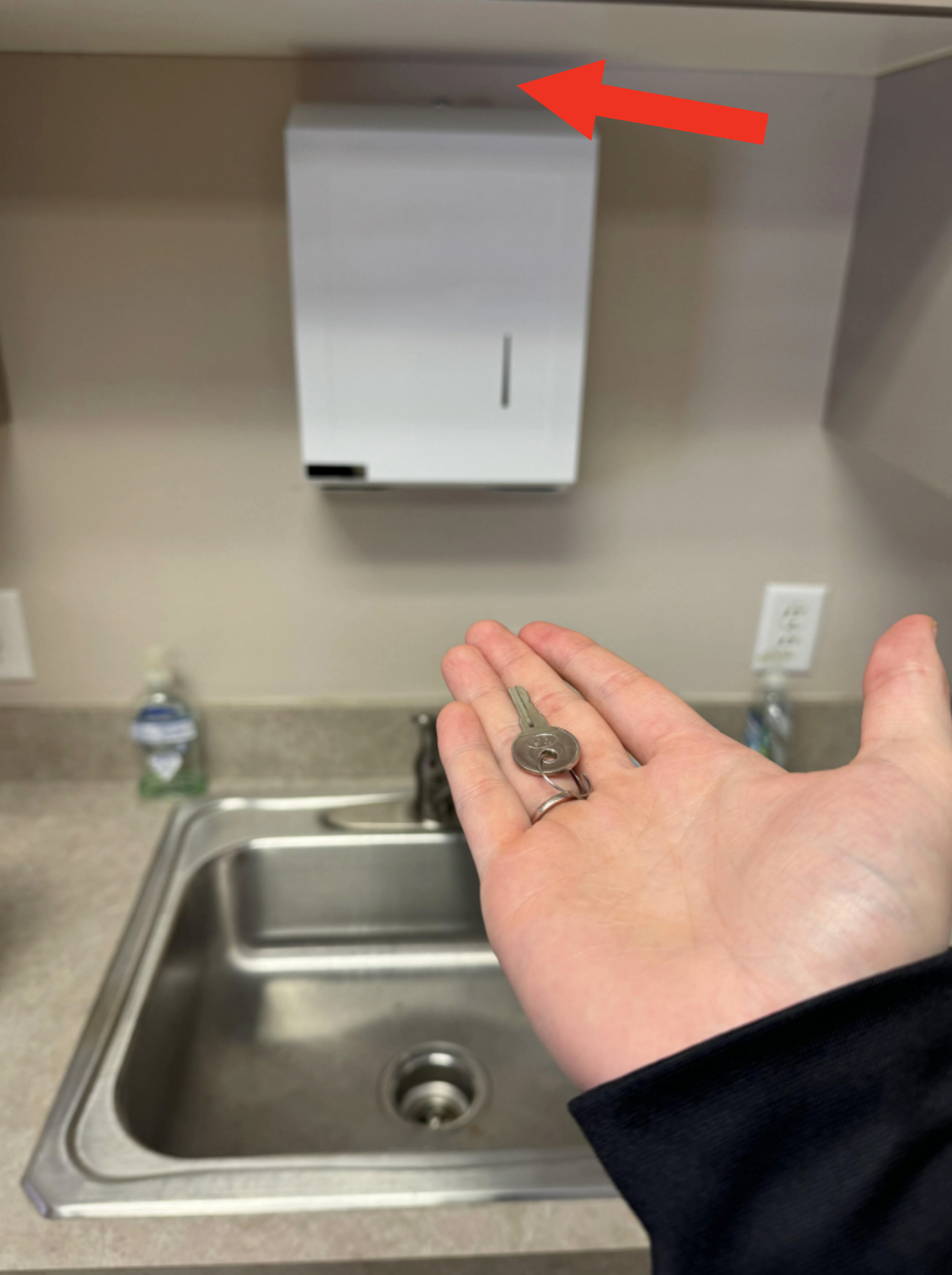 arrow pointing to the narrow space where the key can't fit