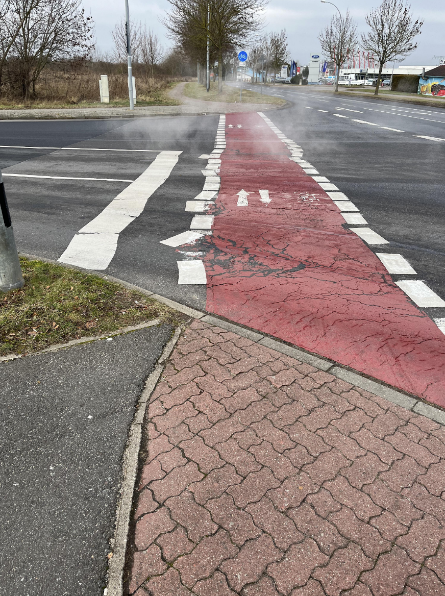 lines on the road painted on crooked