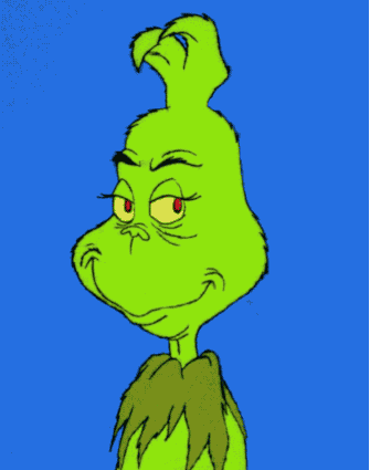a gif of the Grinch from &quot;How the Grinch Stole Christmas!&quot; smiling mischievously