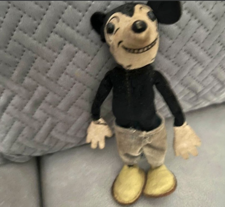 a scary Mickey Mouse doll