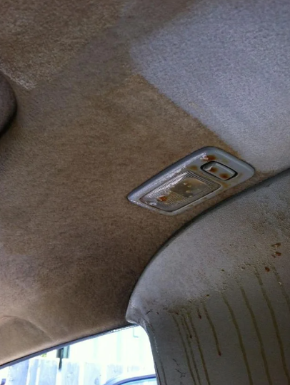 a dirty car ceiling