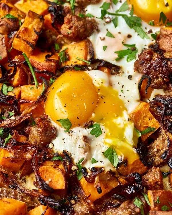 breakfast dish with sweet potato, egg and sausage