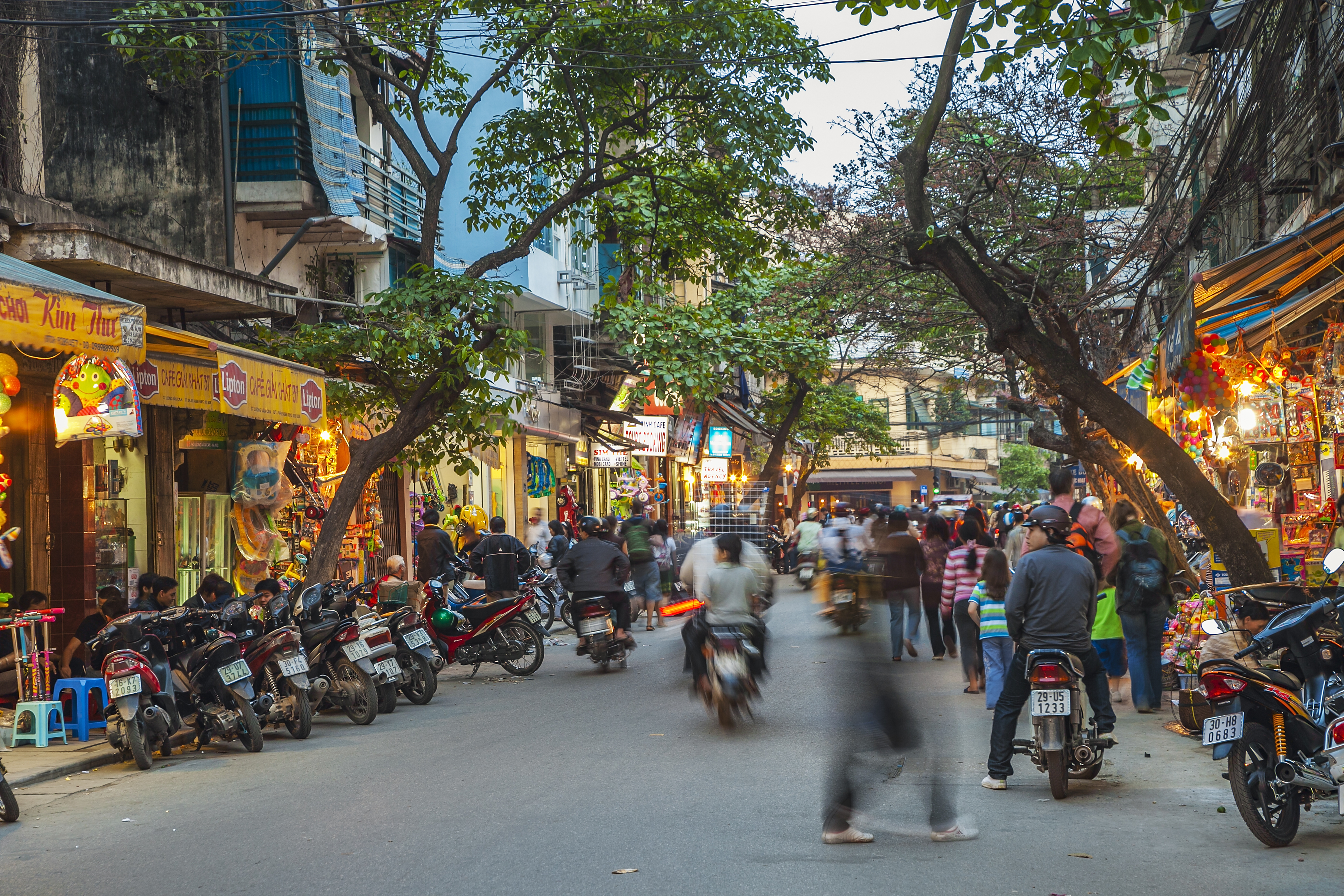 people on motorbikes in Hanoi, Vietnam