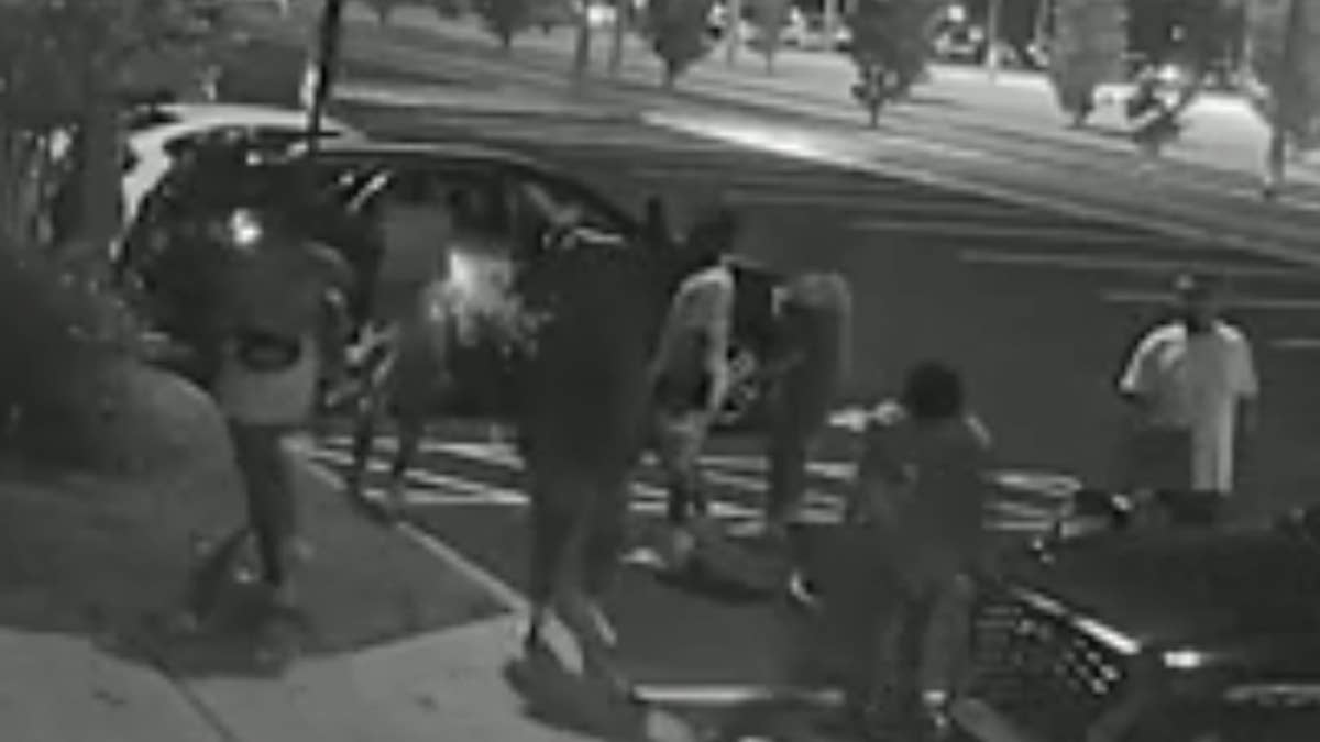 Police have released surveillance video of the incident, where an 11-year-old is accused of shooting two 13-year-olds following football practice.