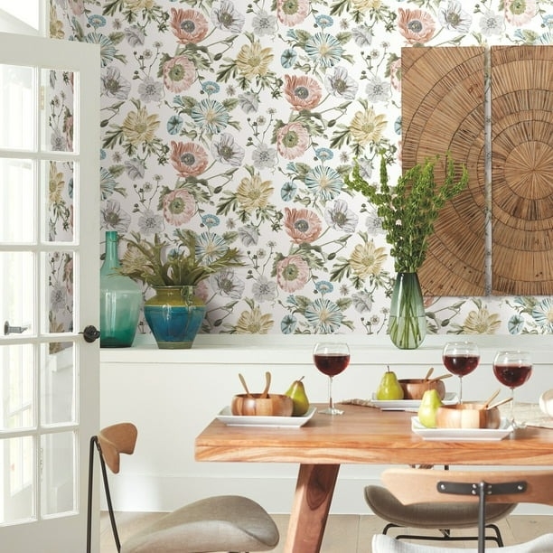 the floral wallpaper on a wall in a kitchen