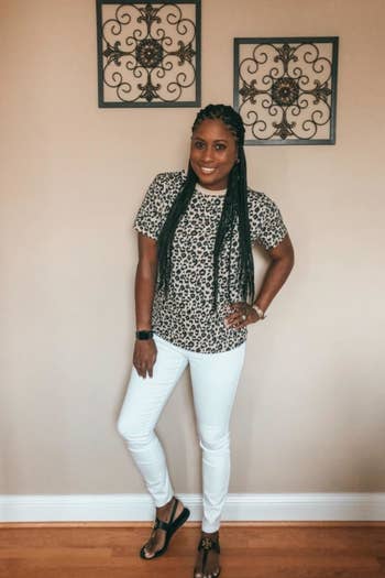 customer wearing leopard pring tee with white jeans
