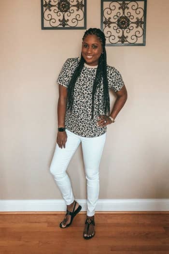 customer wearing leopard pring tee with white jeans