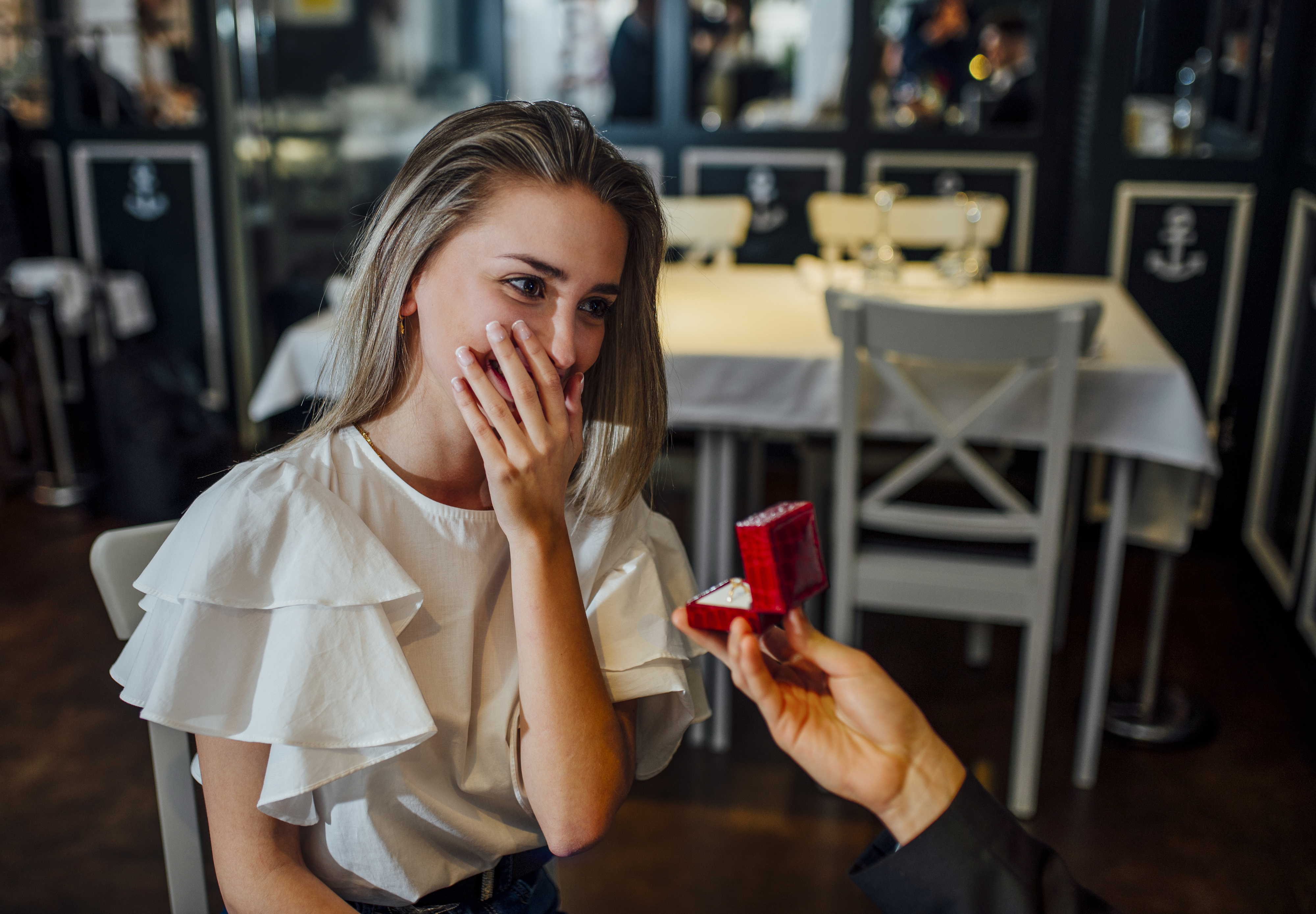 A woman being proposed to