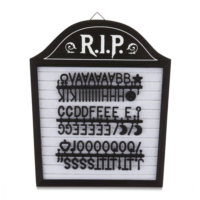 a tombstone shaped letter board