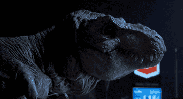 the t-rex roars ink front of a Chevron in &quot;Jurassic Park&quot;
