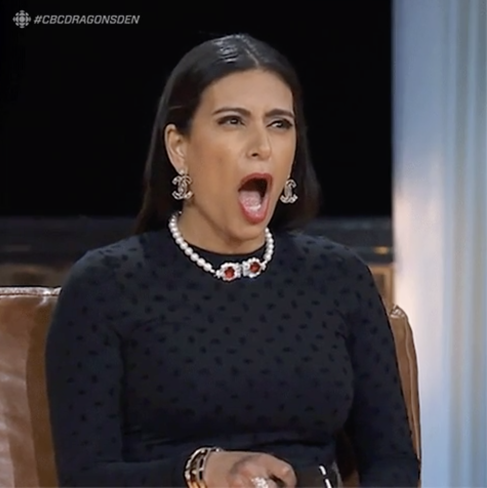 woman with her mouth open wide in shock