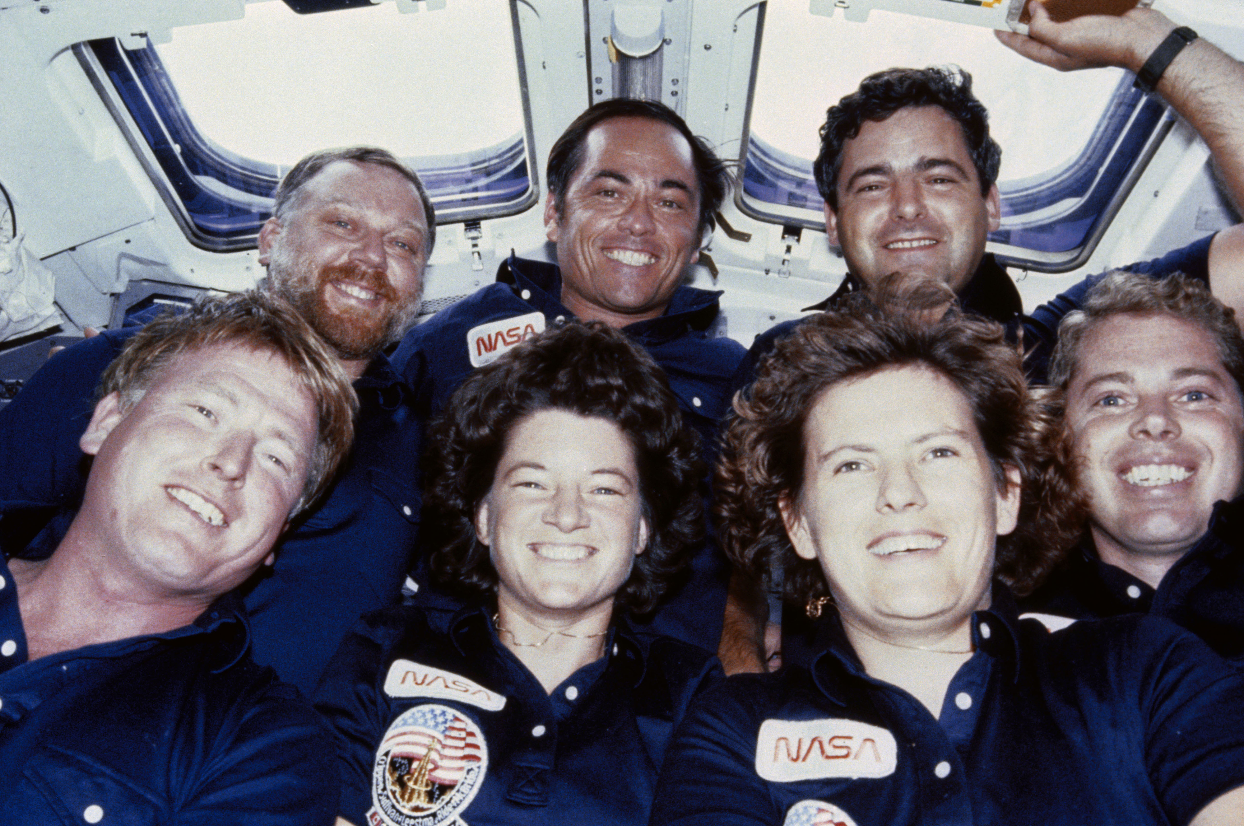 Marc Garneau and the 6 other members aboard the Challenger mission.