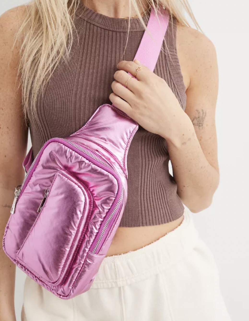 A model wearing the bag in pink
