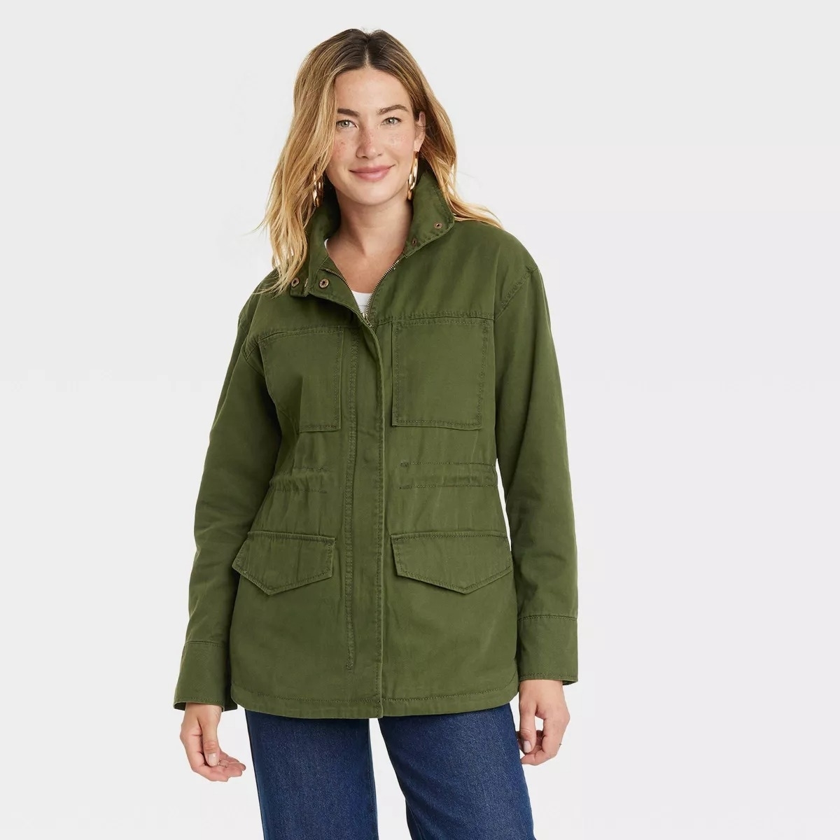 green utility jacket on model