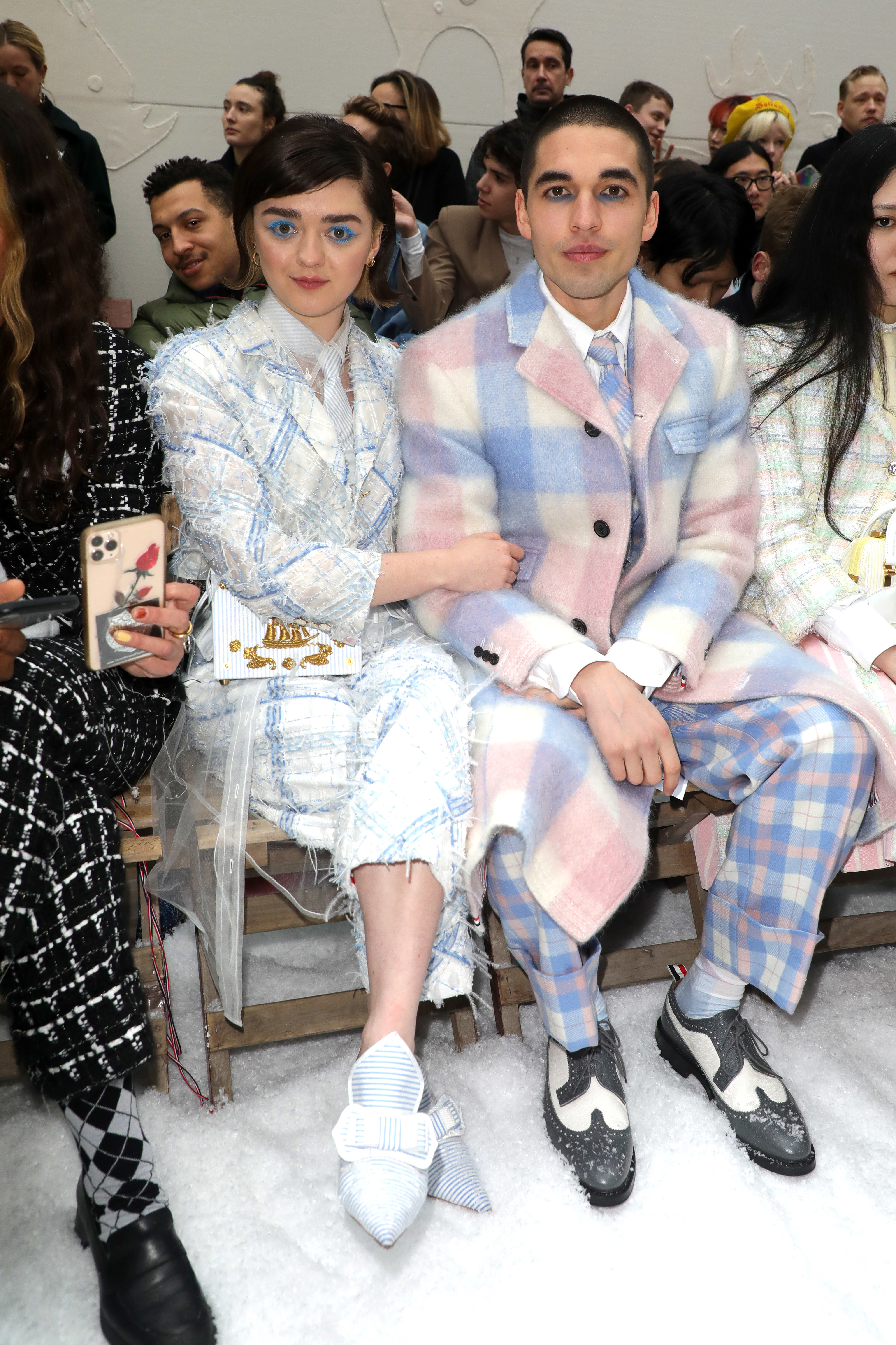 Maisie Williams and Reuben Selby sitting together