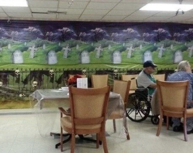 walls covered with a scene from a cemetery