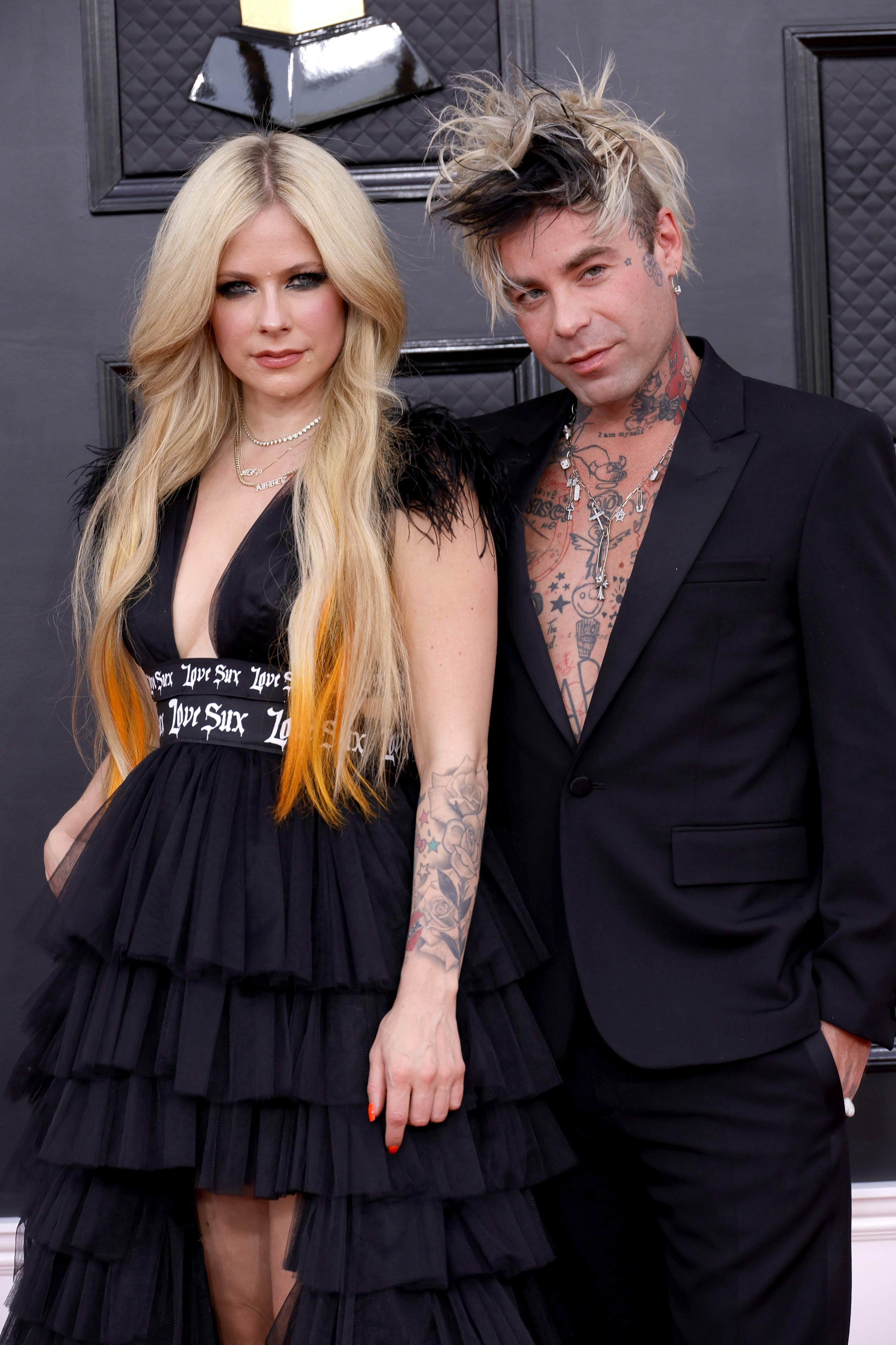 Avril Lavigne and Mod Sun at a media event