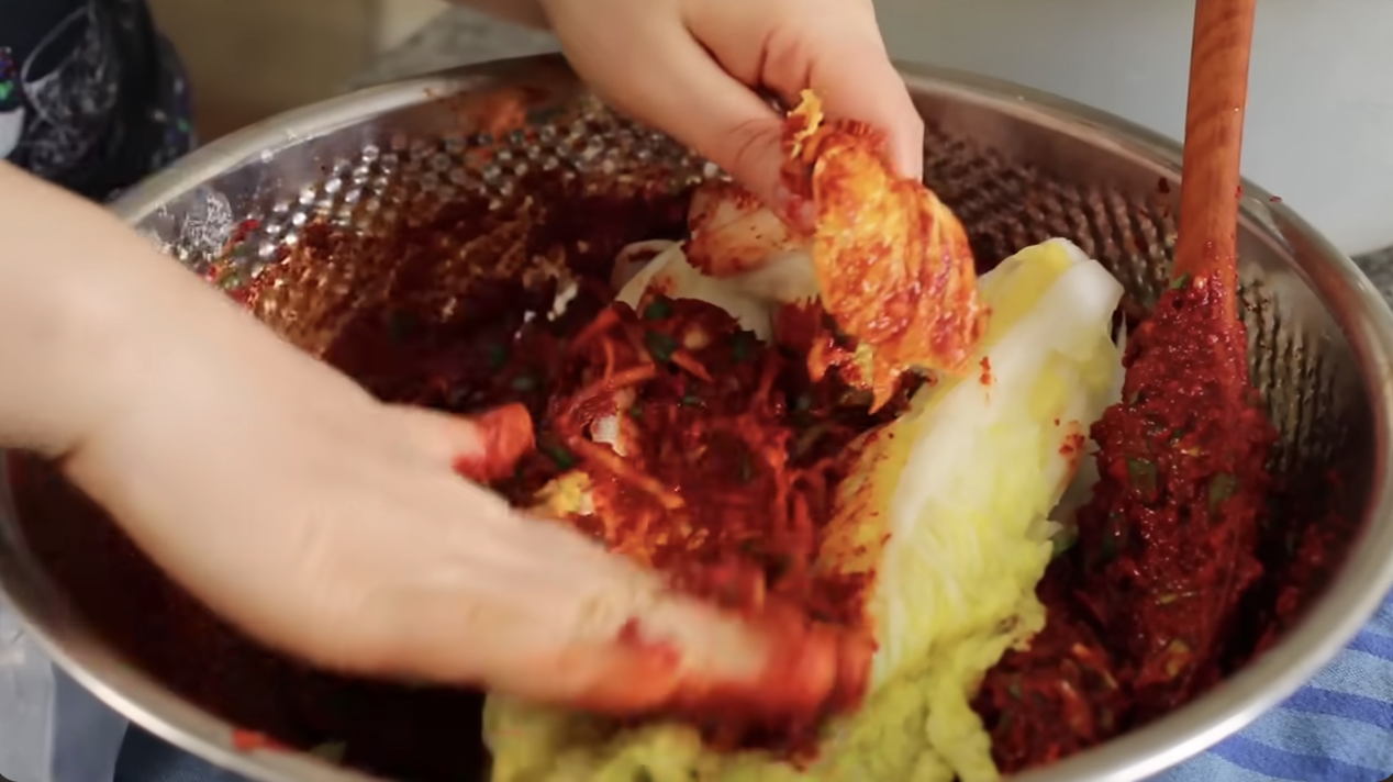 woman making kimchi at home