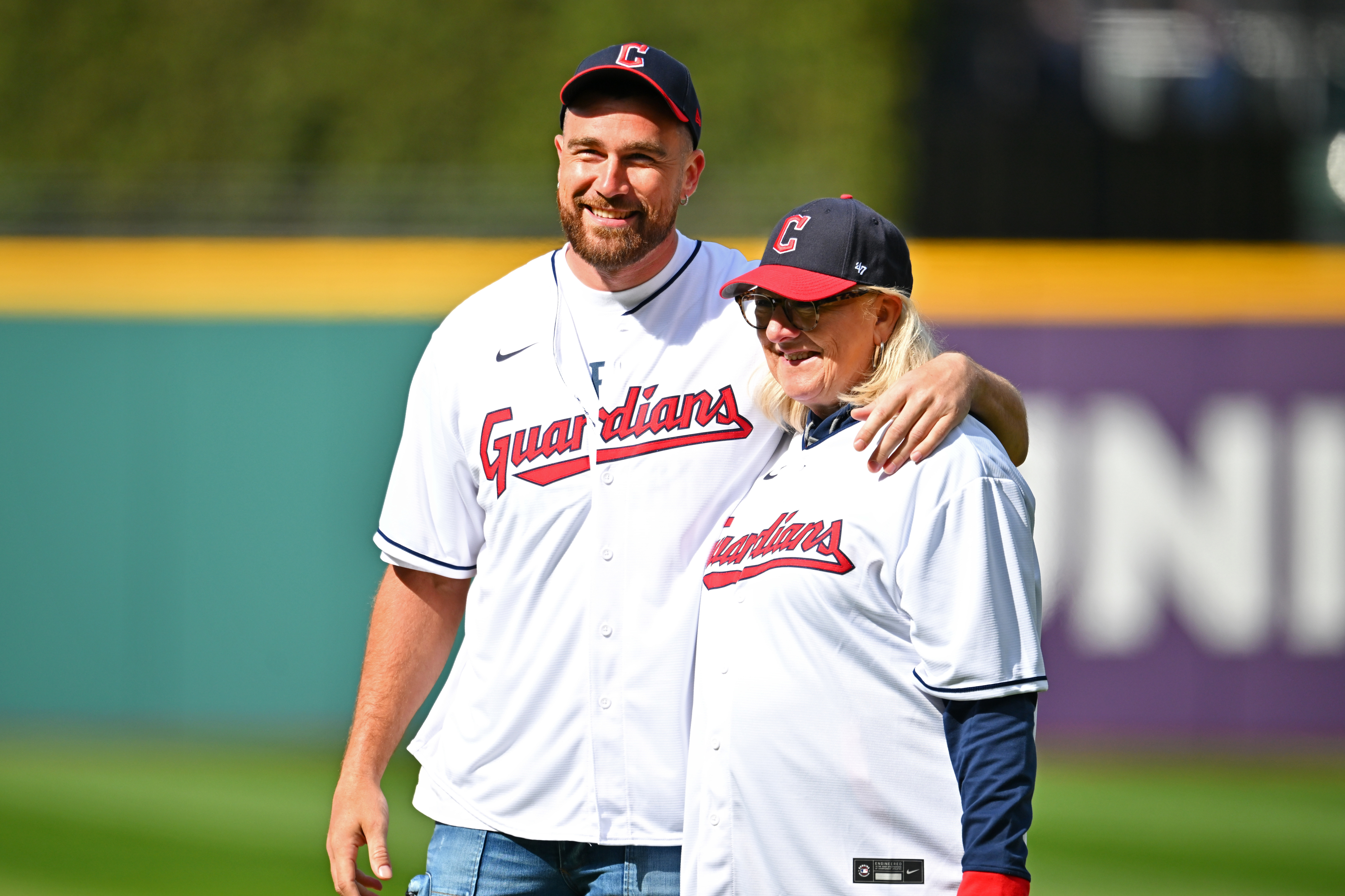 travis and his mom at a baseball game