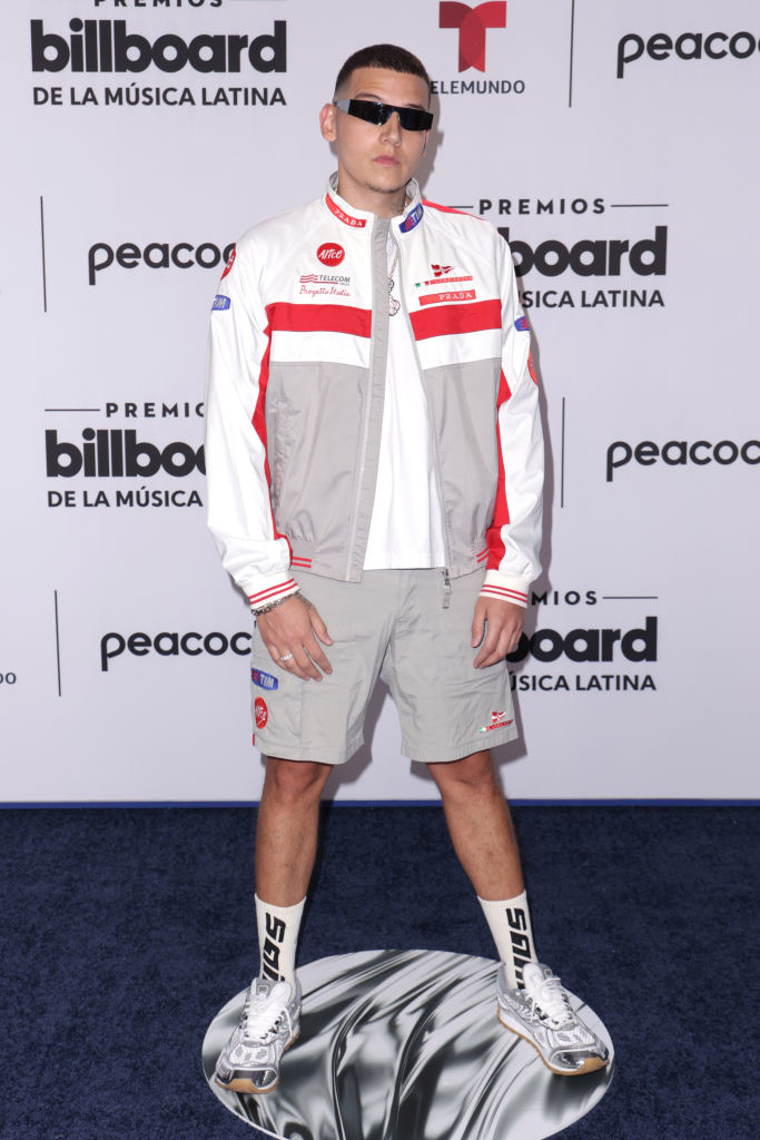 wearing shorts and matching sports jacket with sneakers