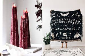 maroon candle that's melting down and a ouija board blanket