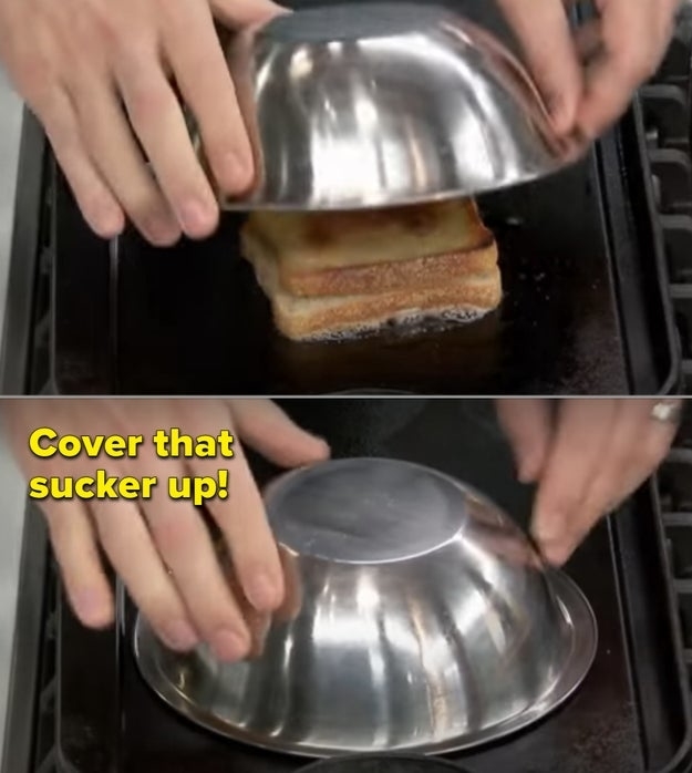 A grilled cheese cooking under a bowl