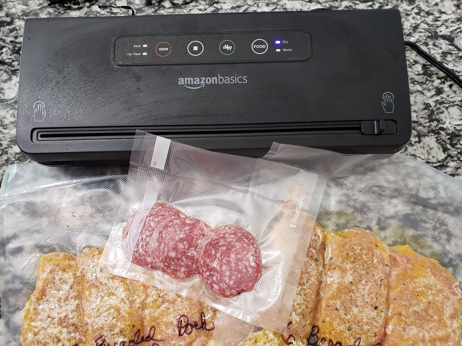Reviewer image of the appliance and sealed meat packages